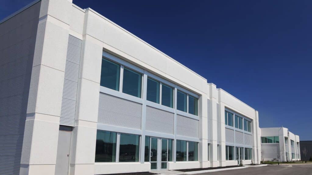 A modern white industrial building